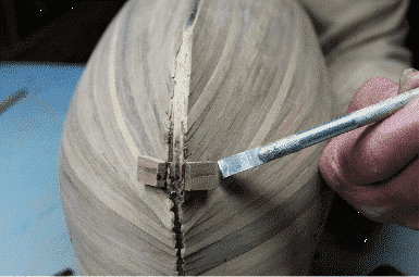 Resealing Planks on the Stem of A Bluff Bow Model Ship 10